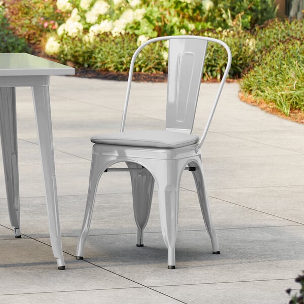 Lancaster Table & Seating Alloy Series Silver Outdoor Cafe Chair with Gray Fabric Magnetic Cushion