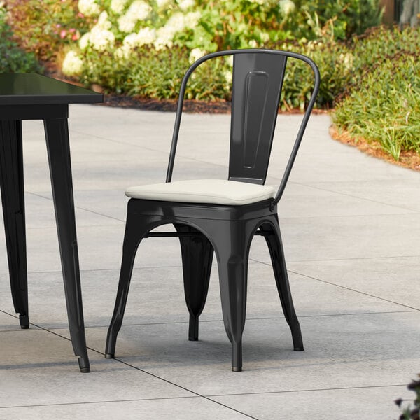 Lancaster Table & Seating Alloy Series Black Outdoor Cafe Chair with Tan Fabric Magnetic Cushion