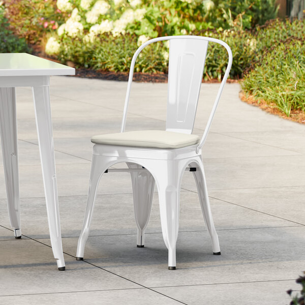Lancaster Table & Seating Alloy Series White Outdoor Cafe Chair with Tan Fabric Magnetic Cushion