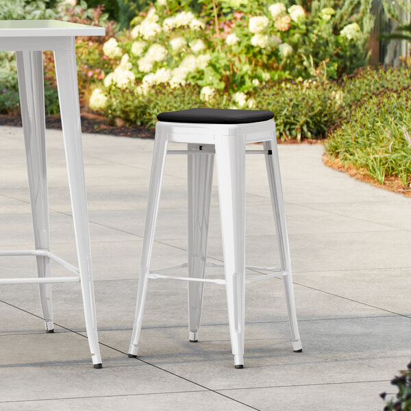 Lancaster Table & Seating Alloy Series White Outdoor Backless Barstool with Black Fabric Magnetic Cushion