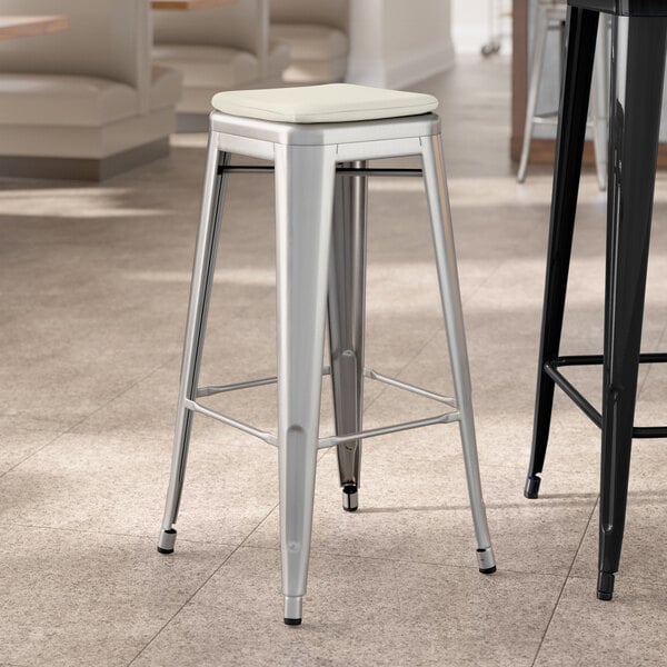 Lancaster Table & Seating Alloy Series Clear Coat Indoor Backless Barstool with Tan Fabric Magnetic Cushion