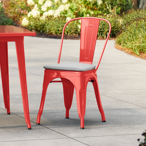 Lancaster Table & Seating Alloy Series Ruby Red Outdoor Cafe Chair with Gray Fabric Magnetic Cushion