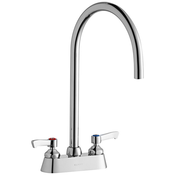 A silver Elkay deck-mount faucet with two gooseneck spouts and lever handles.
