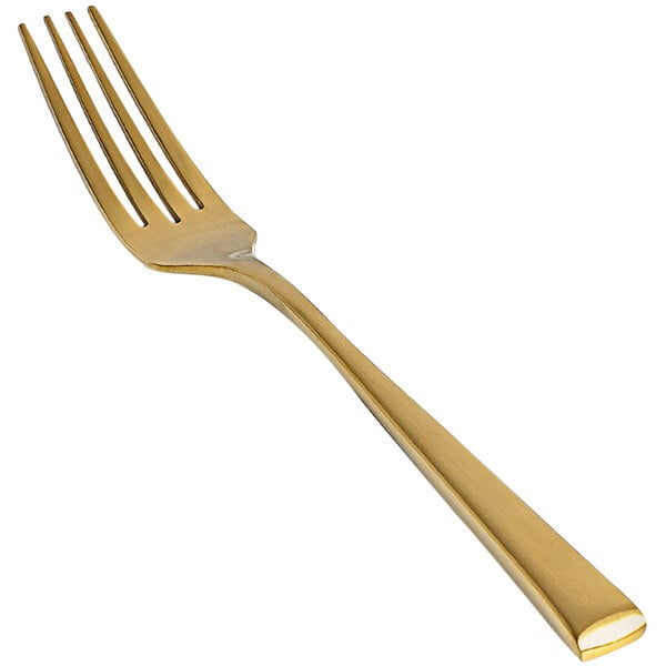 A close-up of a Front of the House Parker stainless steel dinner fork with a matte brass finish.