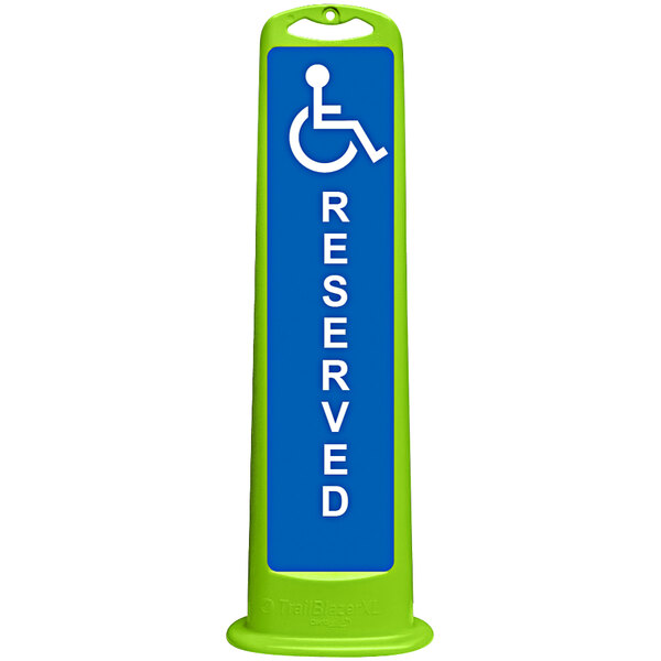 A white vertical rectangular sign with blue and green text reading "Reserved for Handicap" above a green and blue reserved symbol.