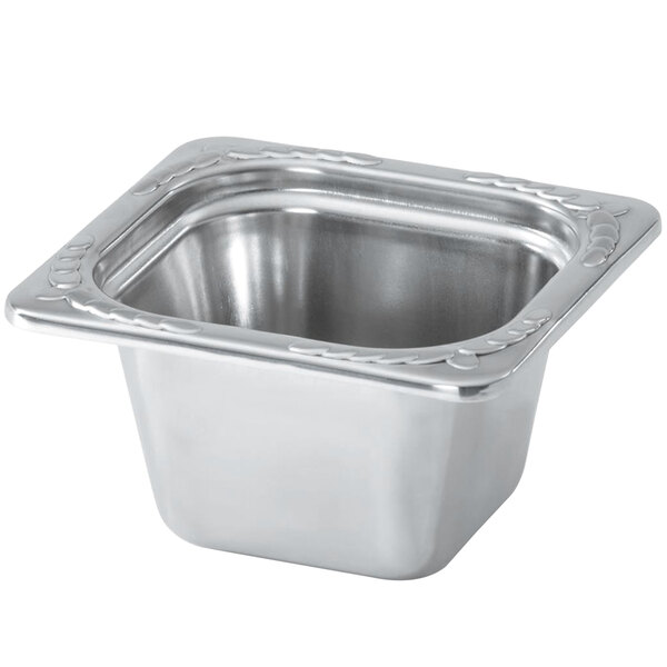 A silver square Vollrath Miramar decorative food pan on a counter.