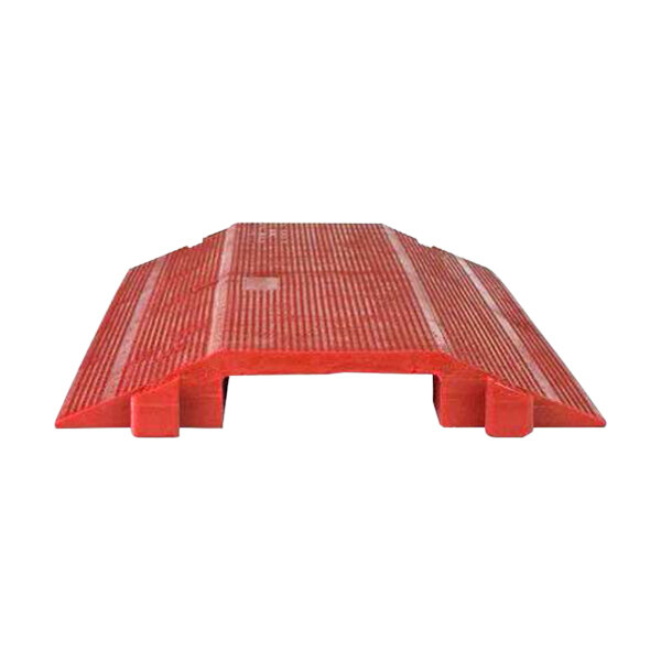 A red plastic ramp with a red plastic base.