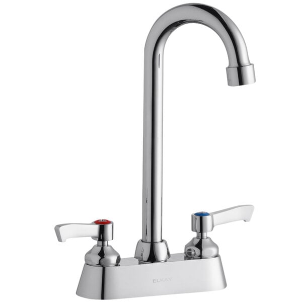 An Elkay deck-mount faucet with 2 silver lever handles and a gooseneck spout.