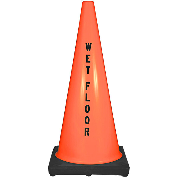 An orange Cortina traffic cone with a "Wet Floor" stencil.