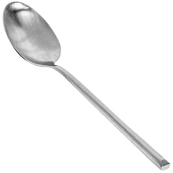 A close-up of the front of a Front of the House Jasper stainless steel teaspoon with a long silver handle.
