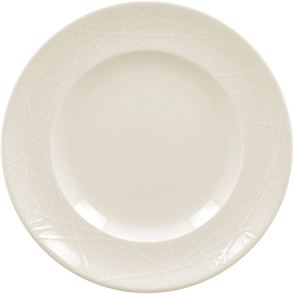 A close up of a white RAK Porcelain flat plate with a pattern on it.