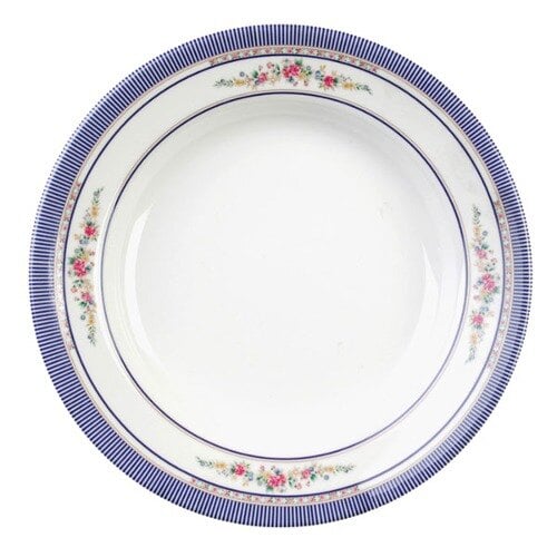 A white melamine soup plate with blue floral design and trim.