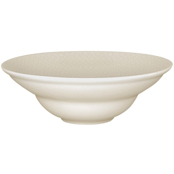 A RAK Porcelain ivory porcelain deep plate with a pattern on it.