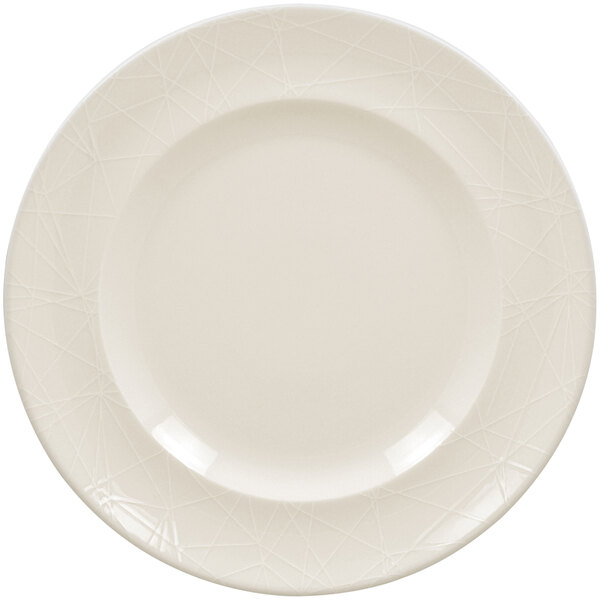 A close up of a RAK Porcelain white flat plate with an embossed design.