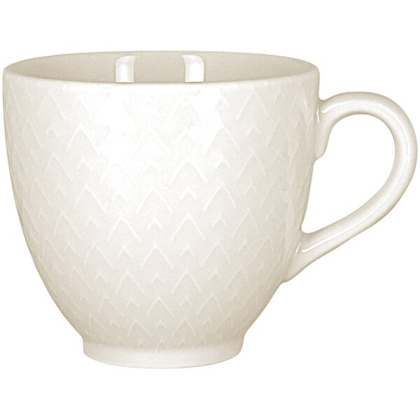 A RAK Porcelain ivory embossed porcelain cup with a handle.