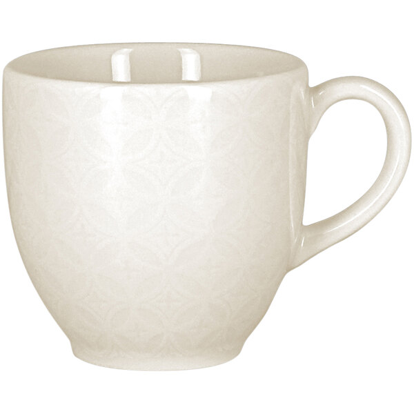 A white RAK Porcelain lace embossed porcelain cup with a handle.