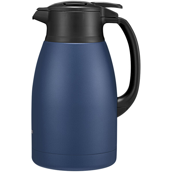 A matte navy blue and black Zojirushi stainless steel vacuum carafe with a black handle and blue lid.