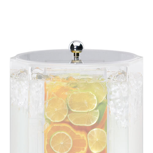 A clear Cal-Mil lid on a glass octagonal beverage dispenser filled with ice and lemon slices.