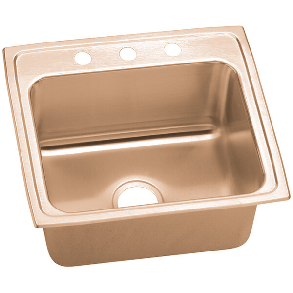 An Elkay CuVerro antimicrobial copper drop-in sink with three faucet holes.