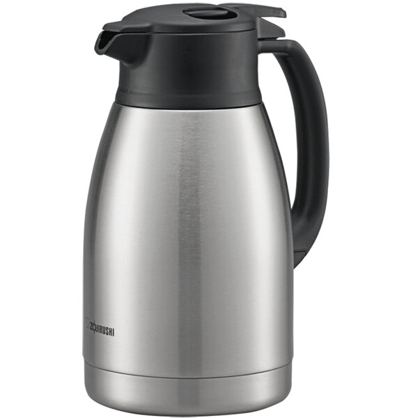 A silver and black Zojirushi stainless steel coffee carafe.