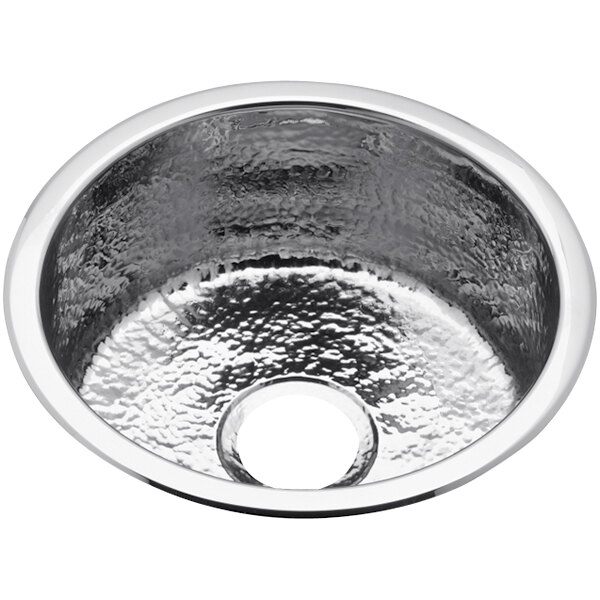 A silver stainless steel Elkay bathroom sink with a circular hole.