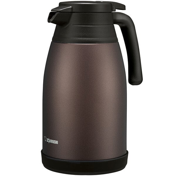 A brown and black Zojirushi stainless steel vacuum carafe with a screw off lid and black handle.
