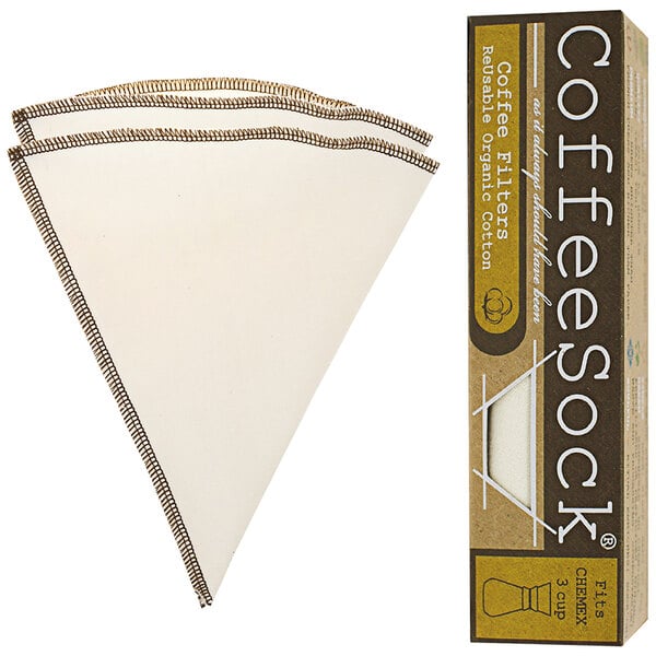 A white triangle-shaped CoffeeSock Chemex coffee filter with brown stitching next to a brown box with white text.