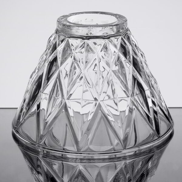 A Sterno clear glass table lamp shade with a diamond pattern.