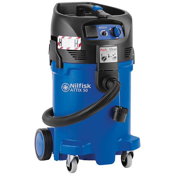 A blue and black Nilfisk wet/dry vacuum with wheels and a blue handle.