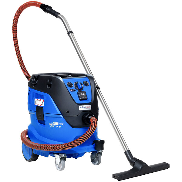 A blue and black Nilfisk wet/dry vacuum with a hose attached.