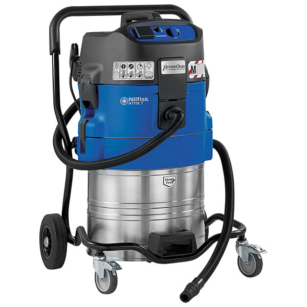 A blue and silver Nilfisk wet/dry vacuum cleaner on wheels.