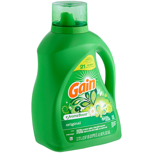 A green bottle of Gain laundry detergent with a green and white label.