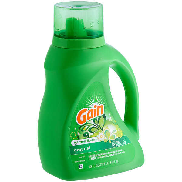 A green bottle of Gain Original laundry detergent with a green label.