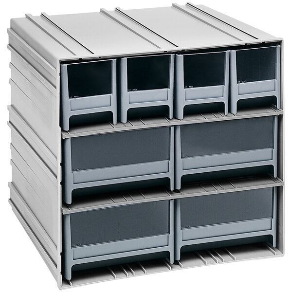 A Quantum grey plastic storage cabinet with medium and large drawers.