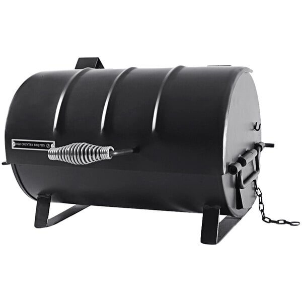 A black metal barrel tabletop grill with a chain.