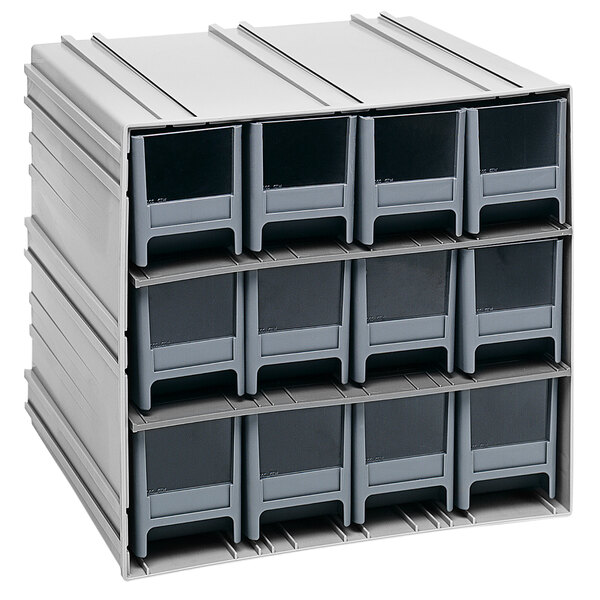 A stack of Quantum grey plastic storage cabinets with medium drawers and windows.