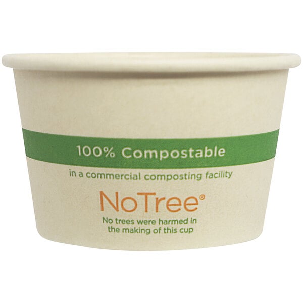 A white World Centric compostable portion cup with a green and white label.