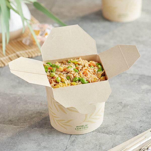 A white World Centric take-out box filled with rice and peas.