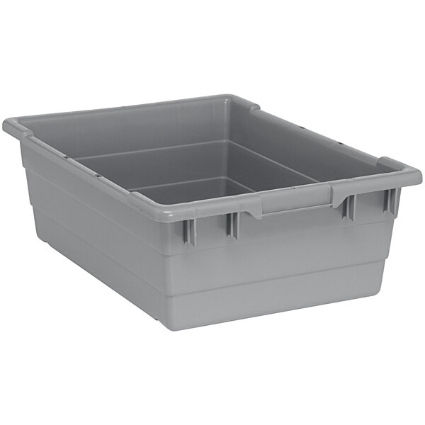 A gray plastic Quantum cross stack tub with built-in handle grips and bottom grooves.