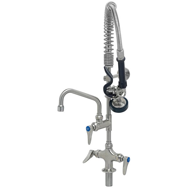 A stainless steel deck mount faucet with a mini pre-rinse unit and hose.