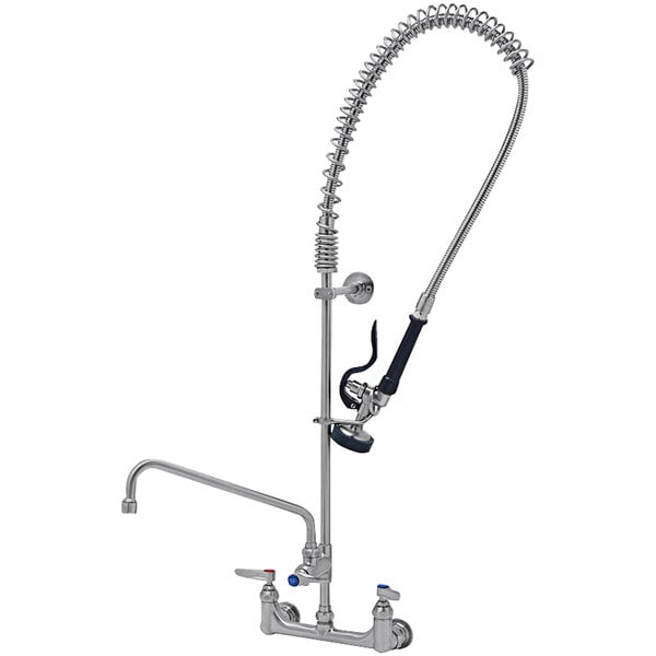 A stainless steel wall mount pre-rinse faucet with a hose and sprayer.