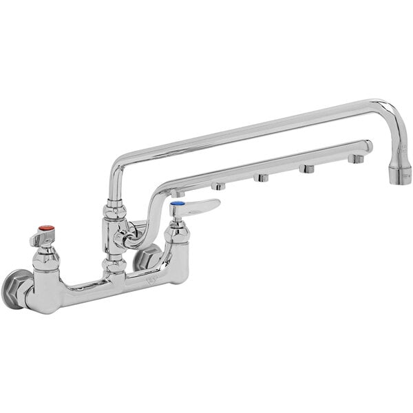 A T&S chrome wall mount faucet with two handles and a hose.