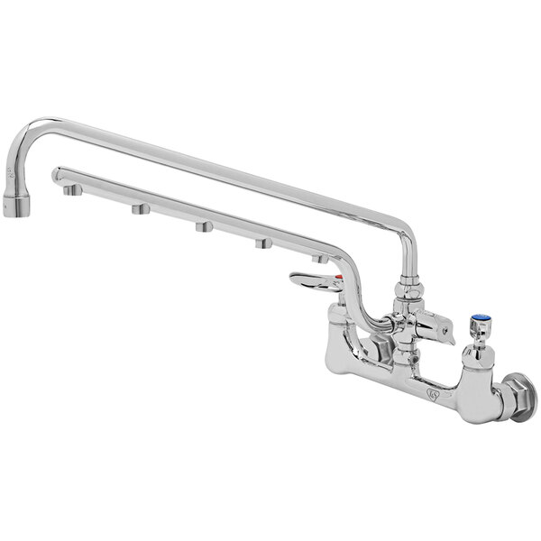 A T&S chrome wall mount faucet with a hose and handle.