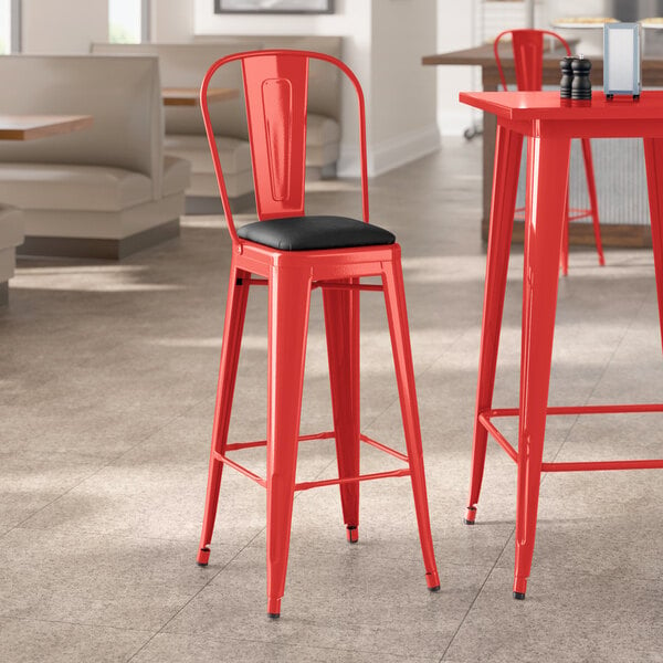 Lancaster Table & Seating Alloy Series Ruby Red Indoor Cafe Barstool with Black Vinyl Cushion