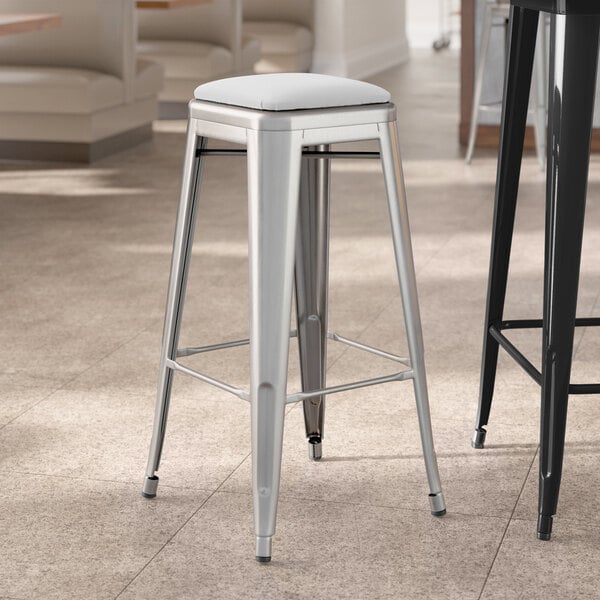 Lancaster Table & Seating Alloy Series Clear Coat Indoor Backless Barstool with White Vinyl Cushion