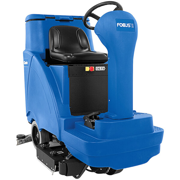 A blue Clarke Focus II R 28D ride-on floor scrubber with a black seat.