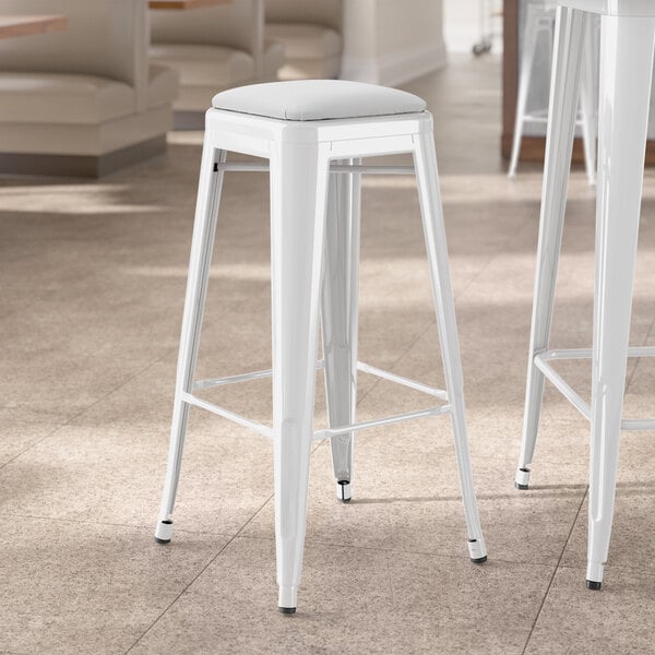 Lancaster Table & Seating Alloy Series White Indoor Backless Barstool with White Vinyl Cushion