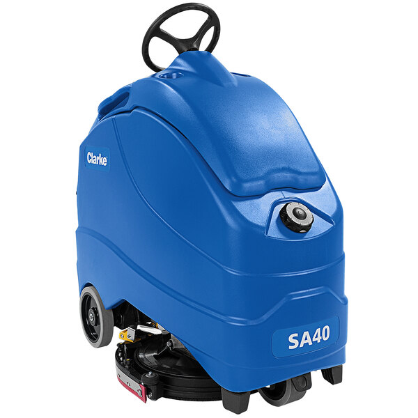 A blue Clarke SA40 ride-on floor scrubber with wheels.
