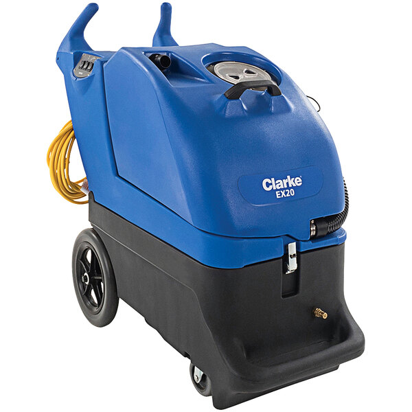 A blue and black Clarke carpet extractor machine on wheels.