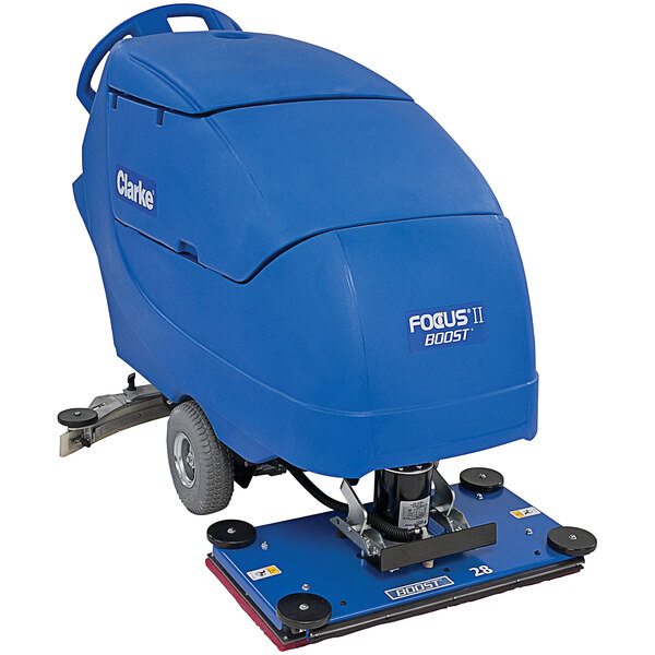 A blue and black Clarke Focus II cordless walk behind disc floor scrubber with wheels.